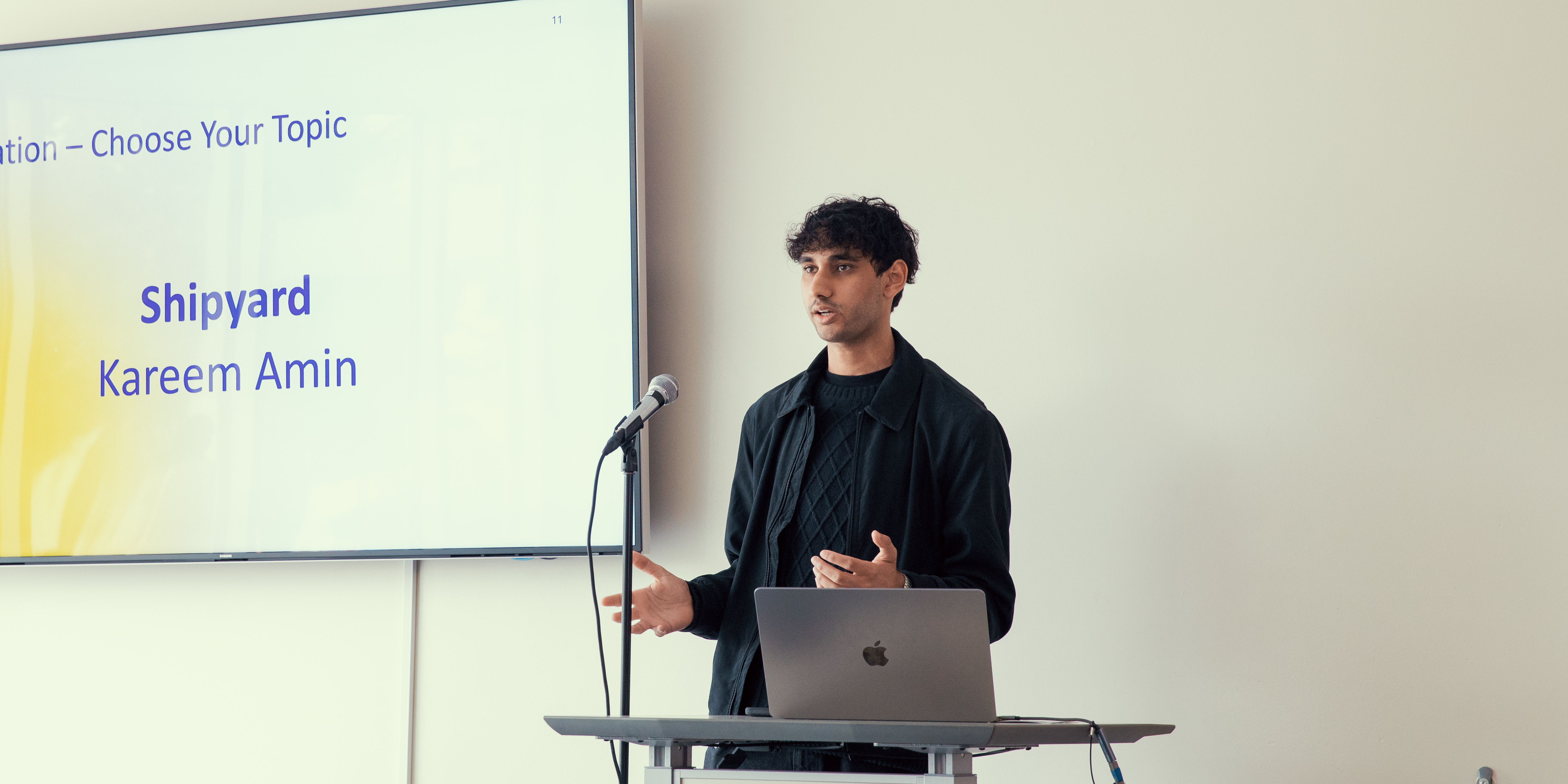 Kareem Amin presenting at the SFSU Student AI Awards 2026