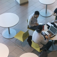 four students at a table